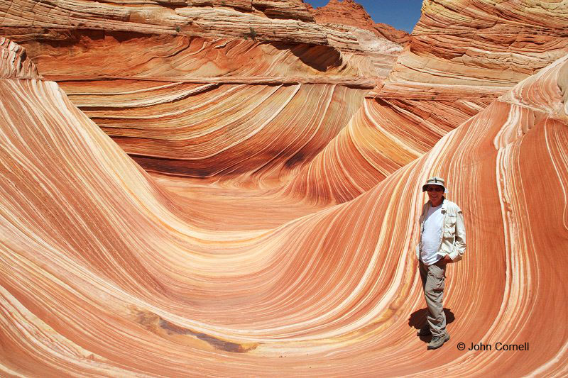 John Cornell in the Wave, a sandstone formation formed by wind and erosion in the North Coyote Buttes area of Vermillion Cliffs National Monument near  Grand Staircase Escalante National Monument.